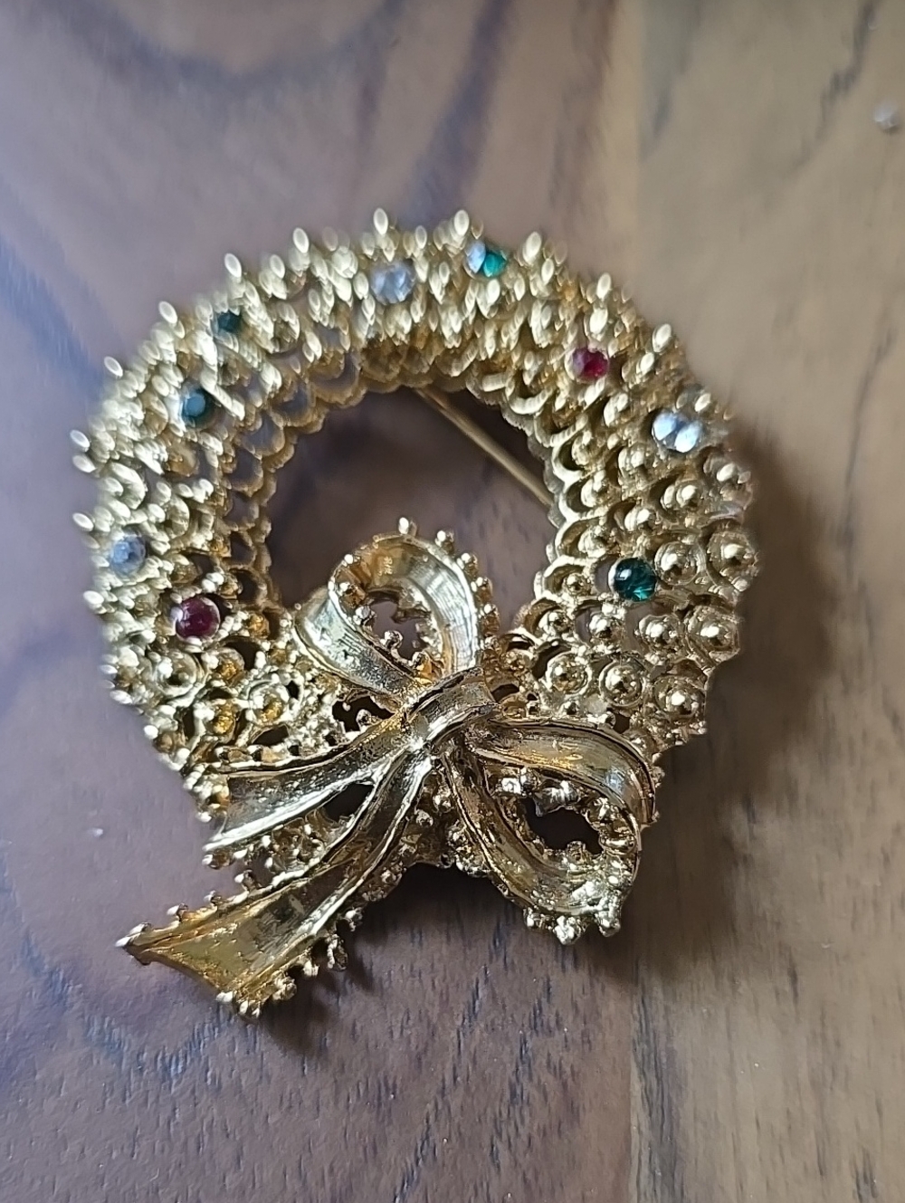 Gold Tone Wreath Brooch with Colored Rhinestones